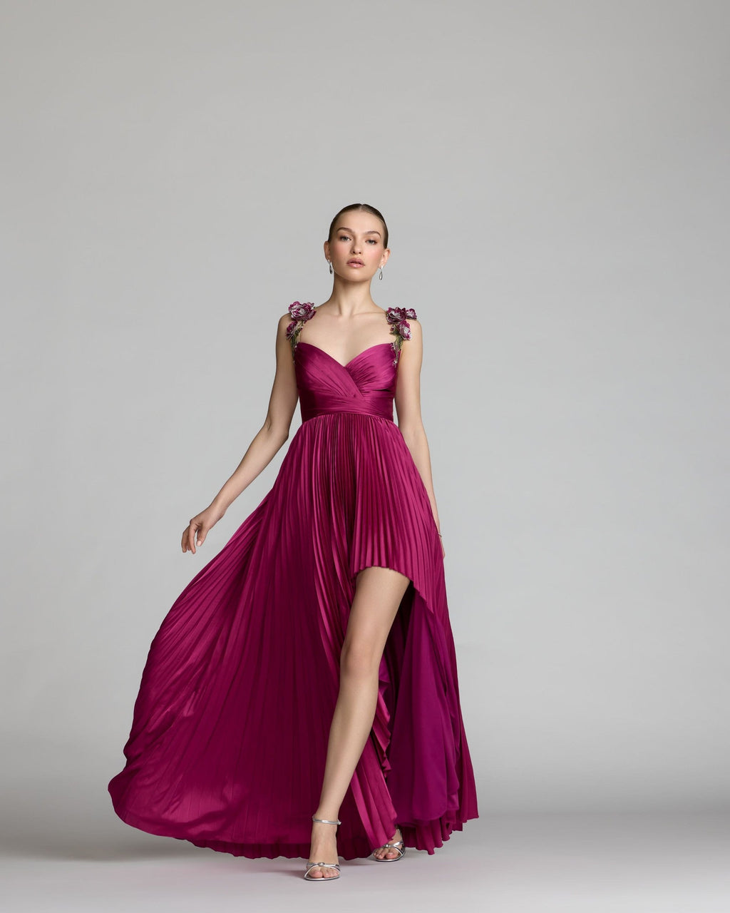 Magenta Pleated High Low Gown With 3D Floral Straps