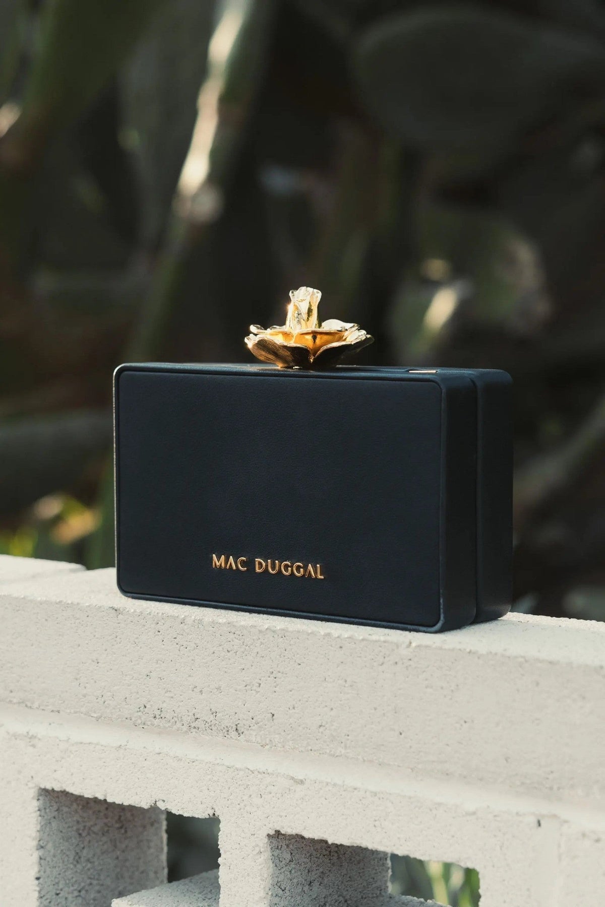 Black Mini Leather Clutch with Gold Rose Closure